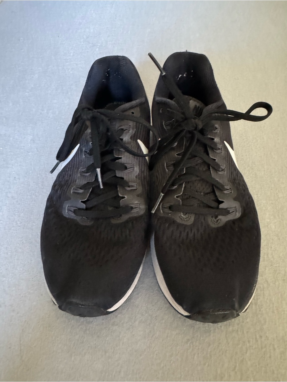 Nike Black Athletic Running Shoes with White Swoosh
